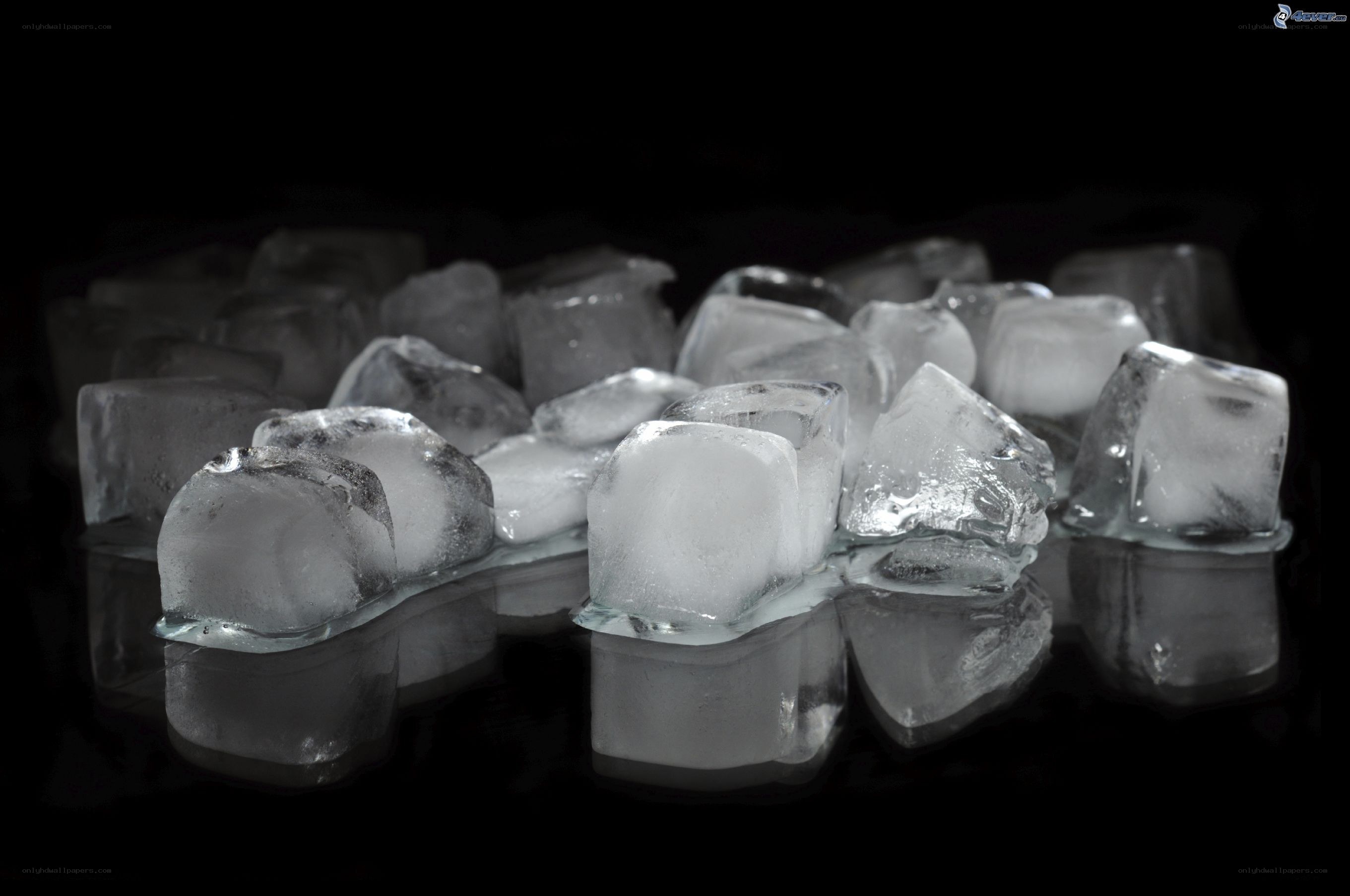 ice cubes on black surface