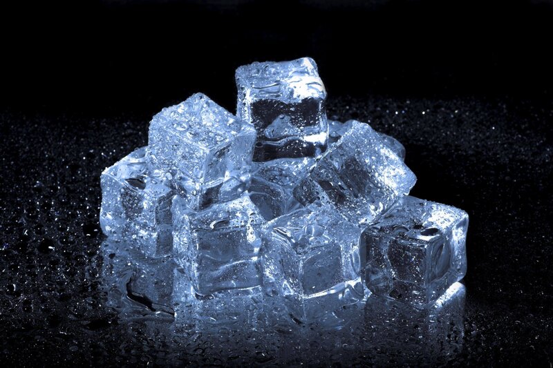 Ice Cubes on Dark Surface — Black