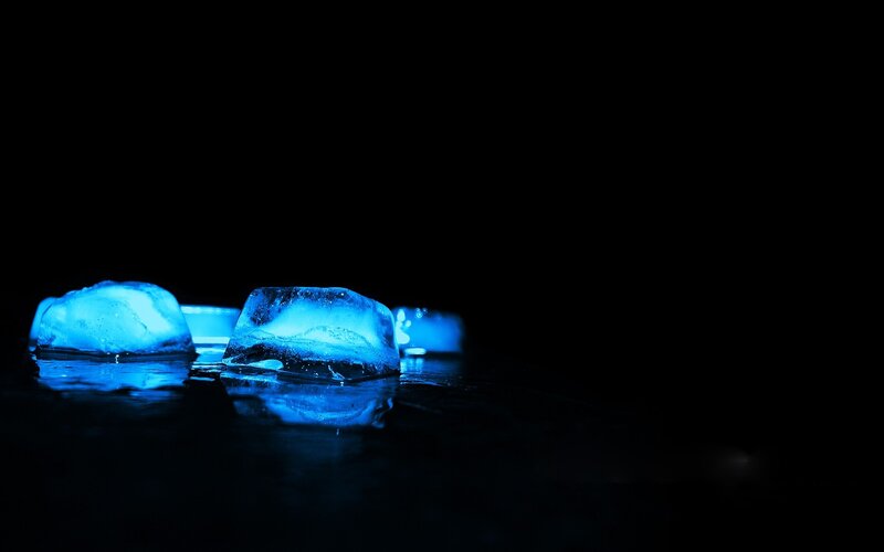 Ice Cubes on Dark Surface