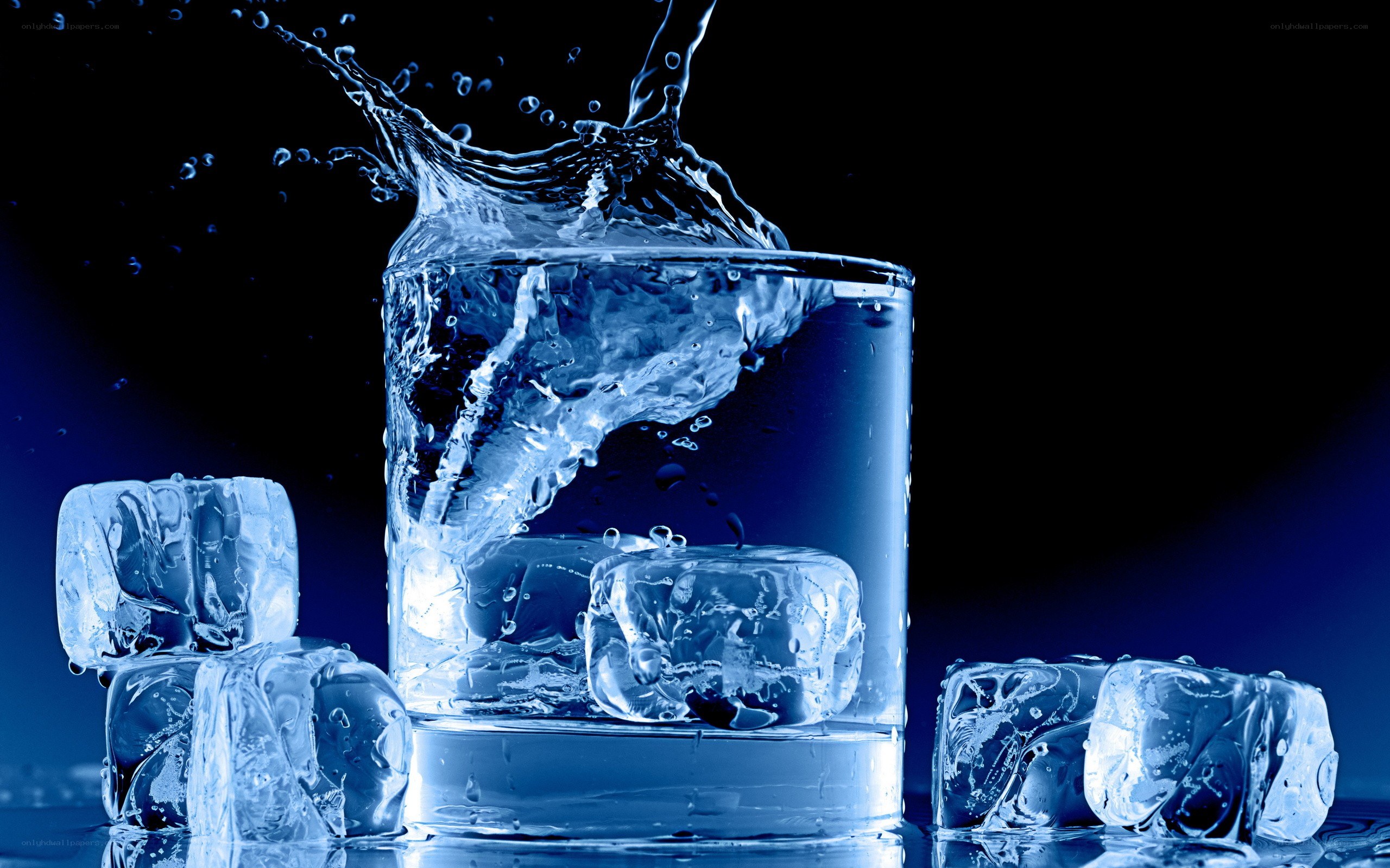 ice cubes splashing in water