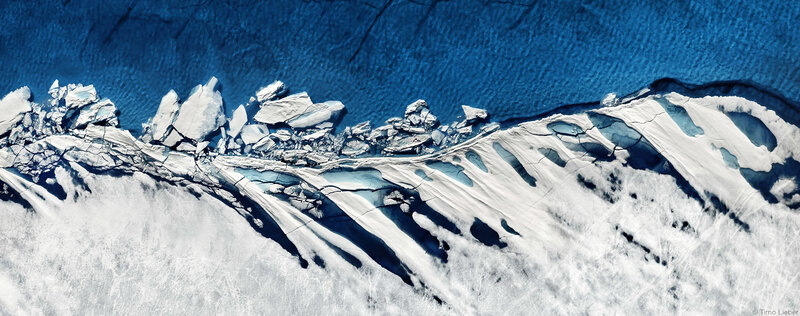 Ice Floes in Ocean — Blue