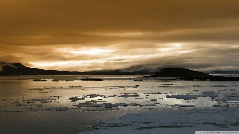 Ice Floes in Polar Water — Brown, Dramatic, Sunset, Photograph, Icebergs, Mountains, Clouds