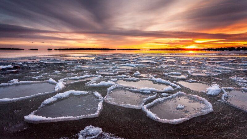 Ice Floes on Water — Orange, Dramatic, Sunset