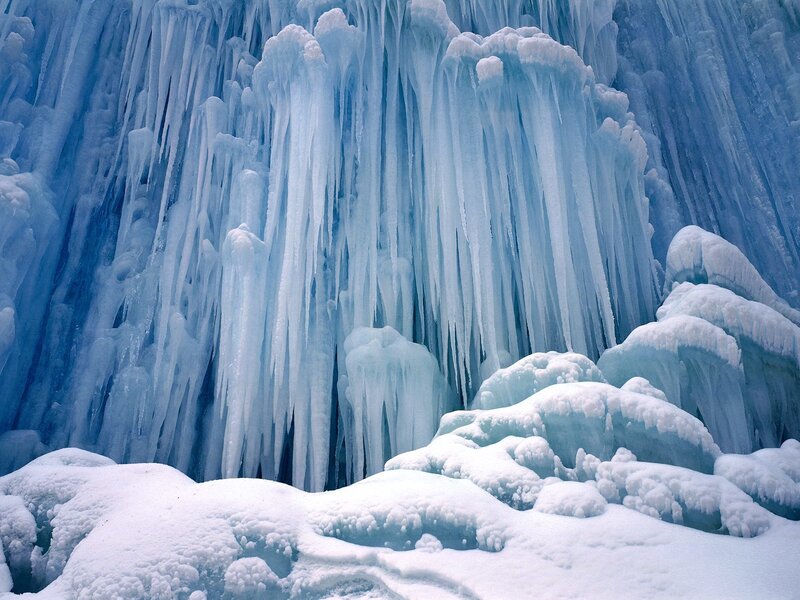 Ice Formations on Cliff — Blue