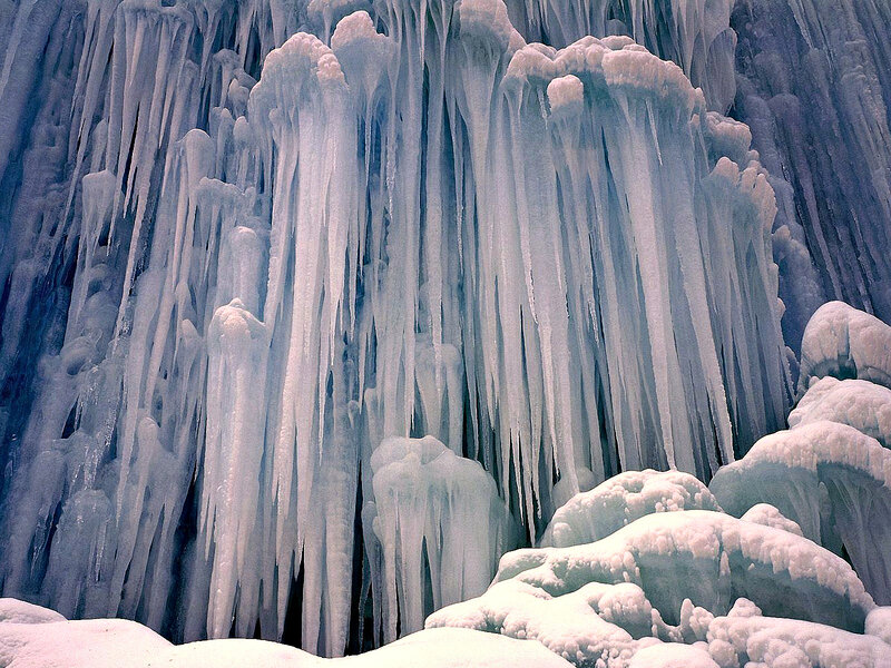 Ice Formations on Cliff — White