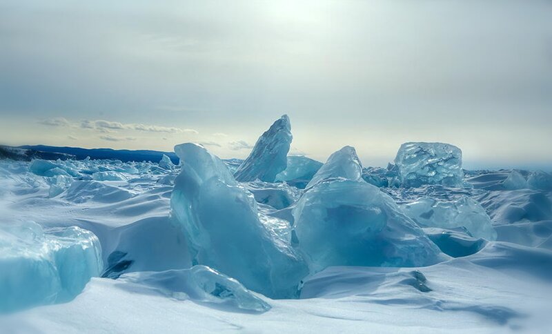 Ice Formations on Frozen Lake — Blue