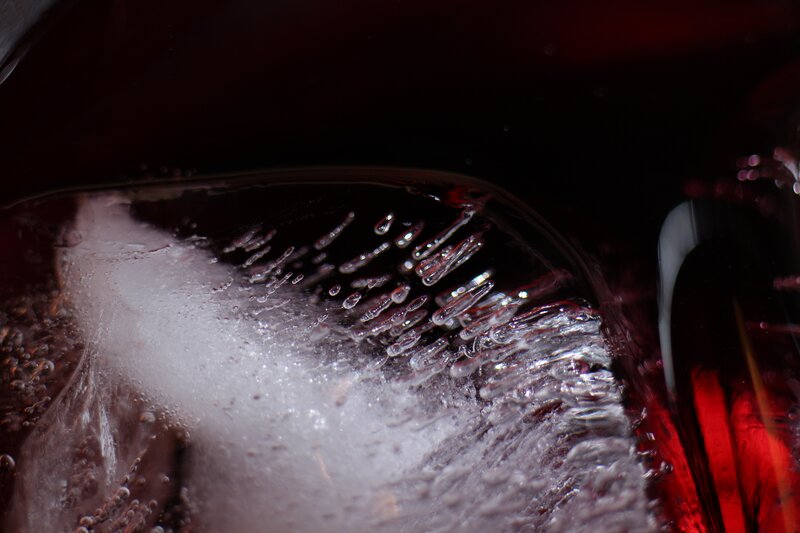 ice in red liquid