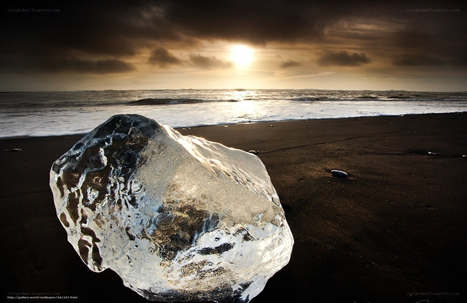 ice on black sand beach