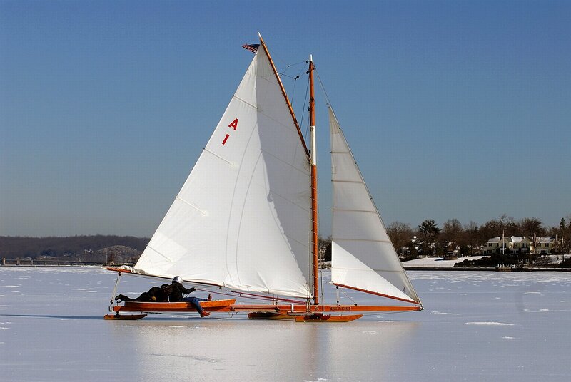Ice sailboat on frozen lake