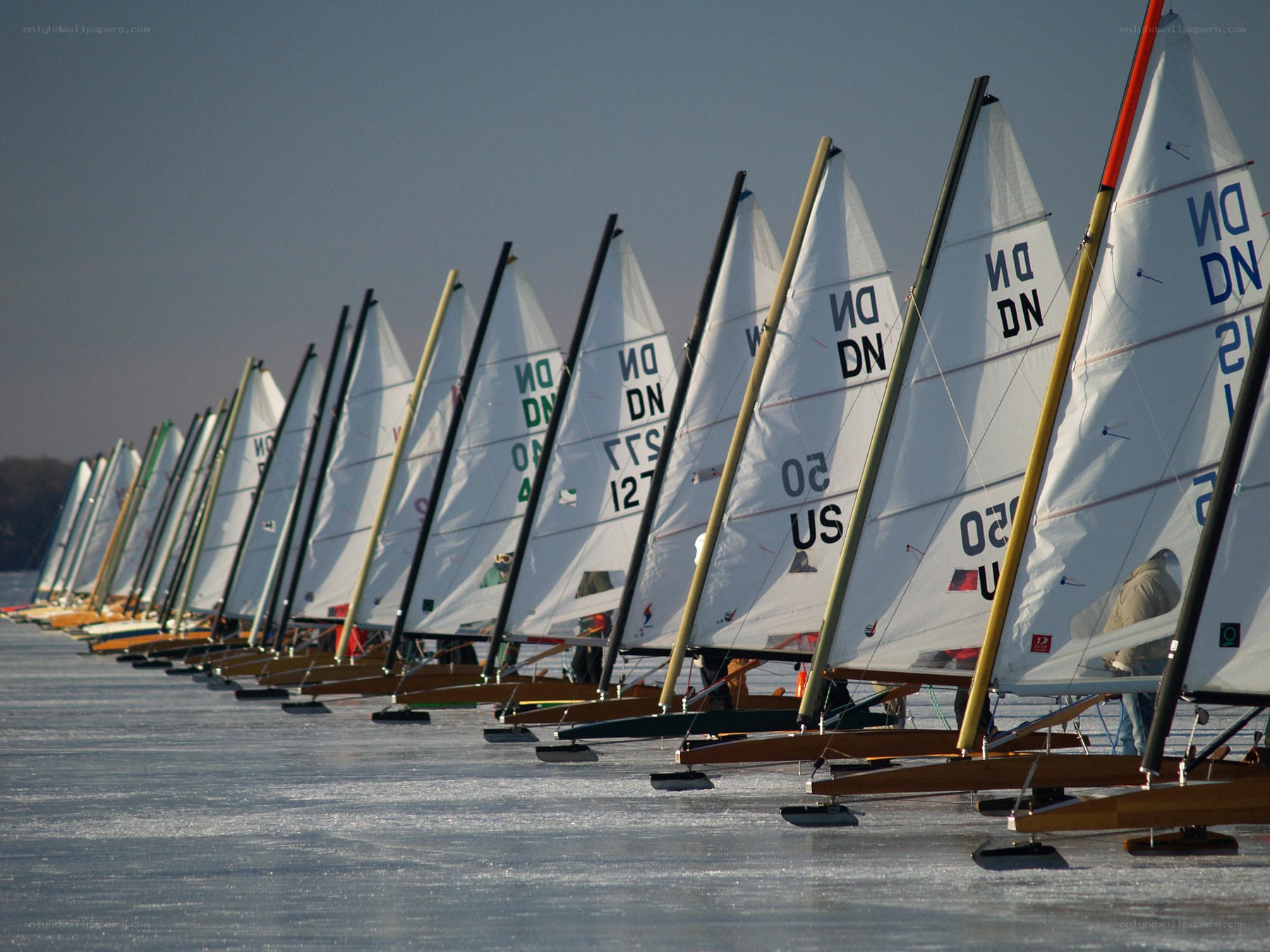 Ice sailing boats in a line