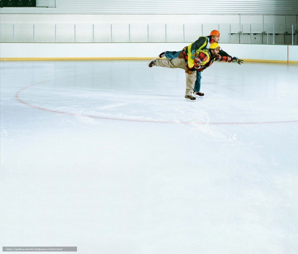Ice skaters in safety gear