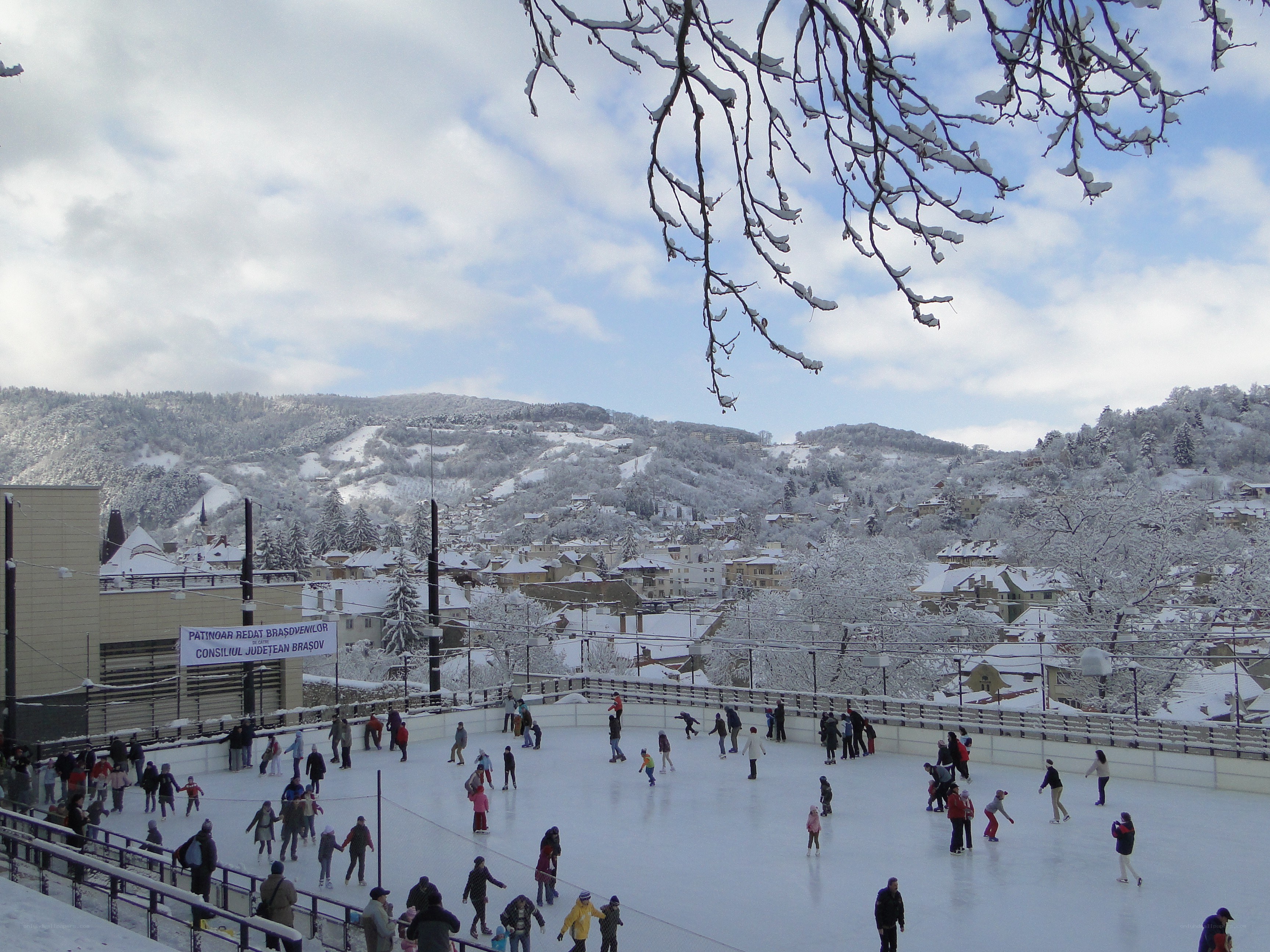 Ice skating in snowy town