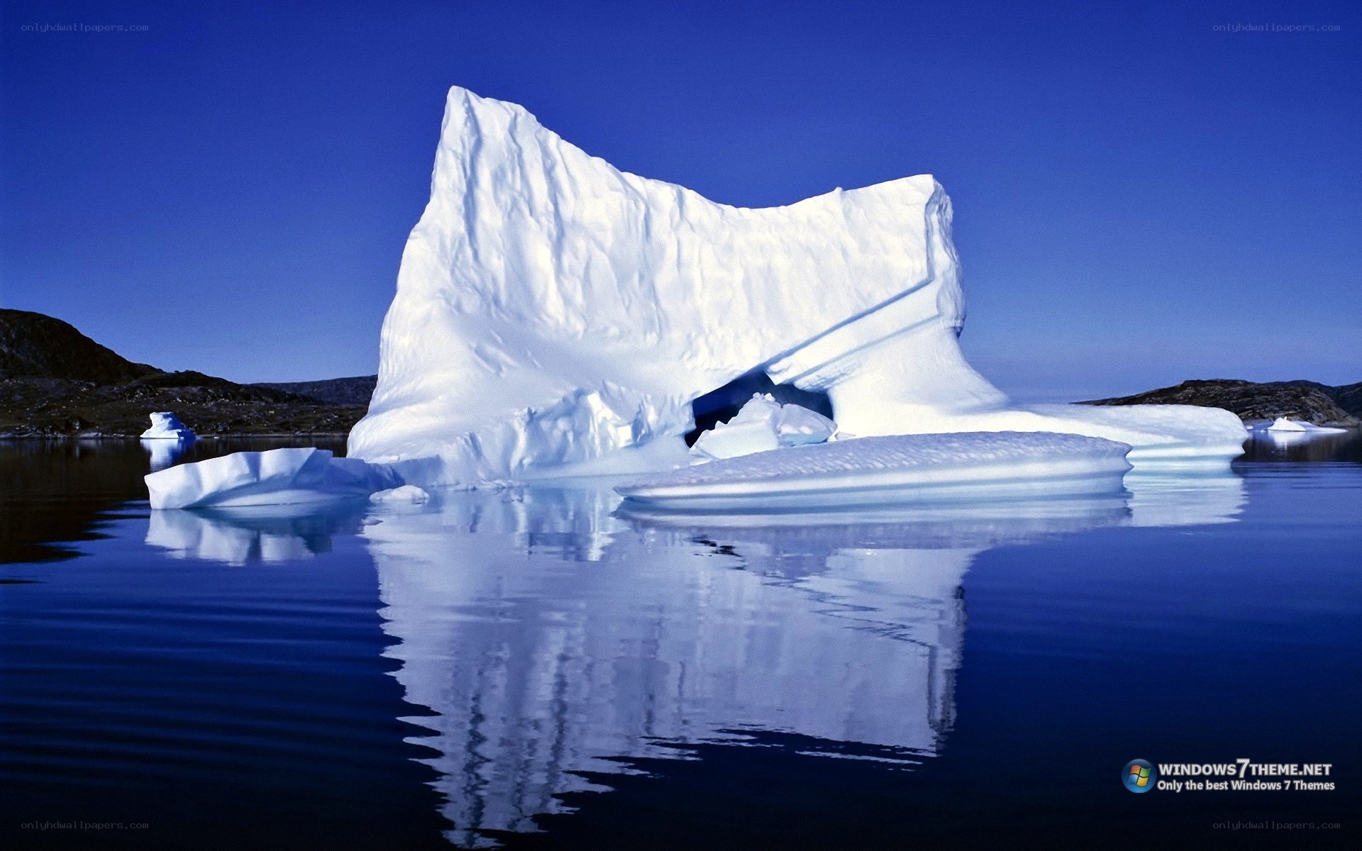 Iceberg floating in calm water