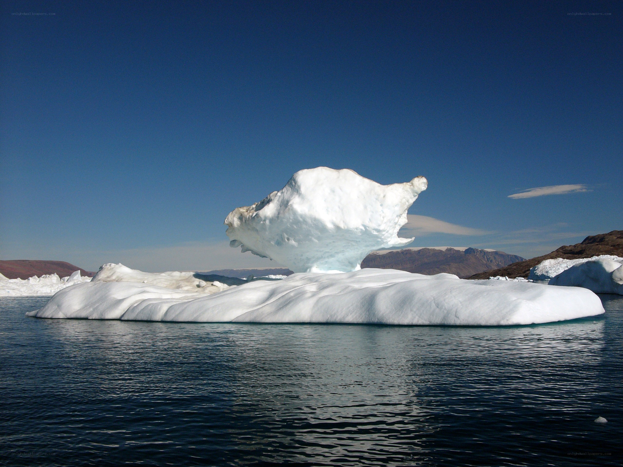 Iceberg floating in calm water