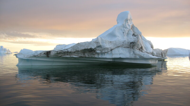 Iceberg floating in calm water