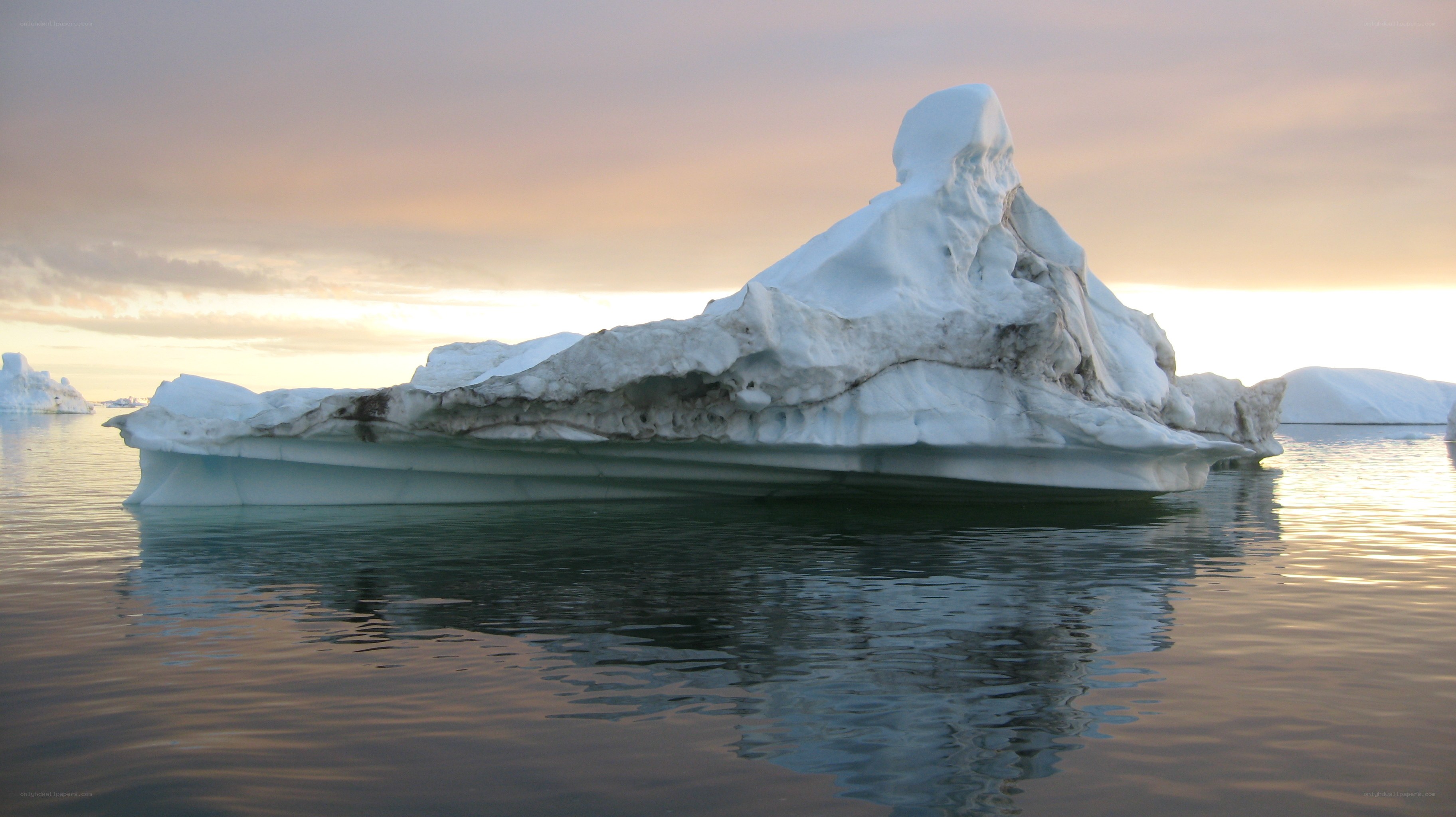 Iceberg floating in calm water