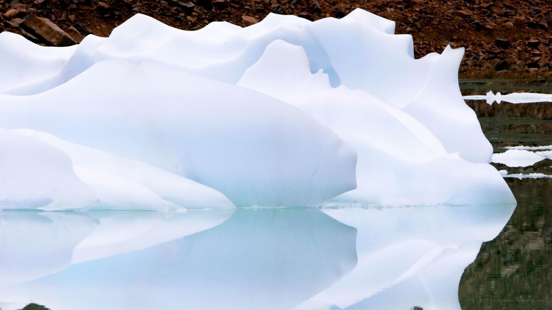 Iceberg floating in calm water