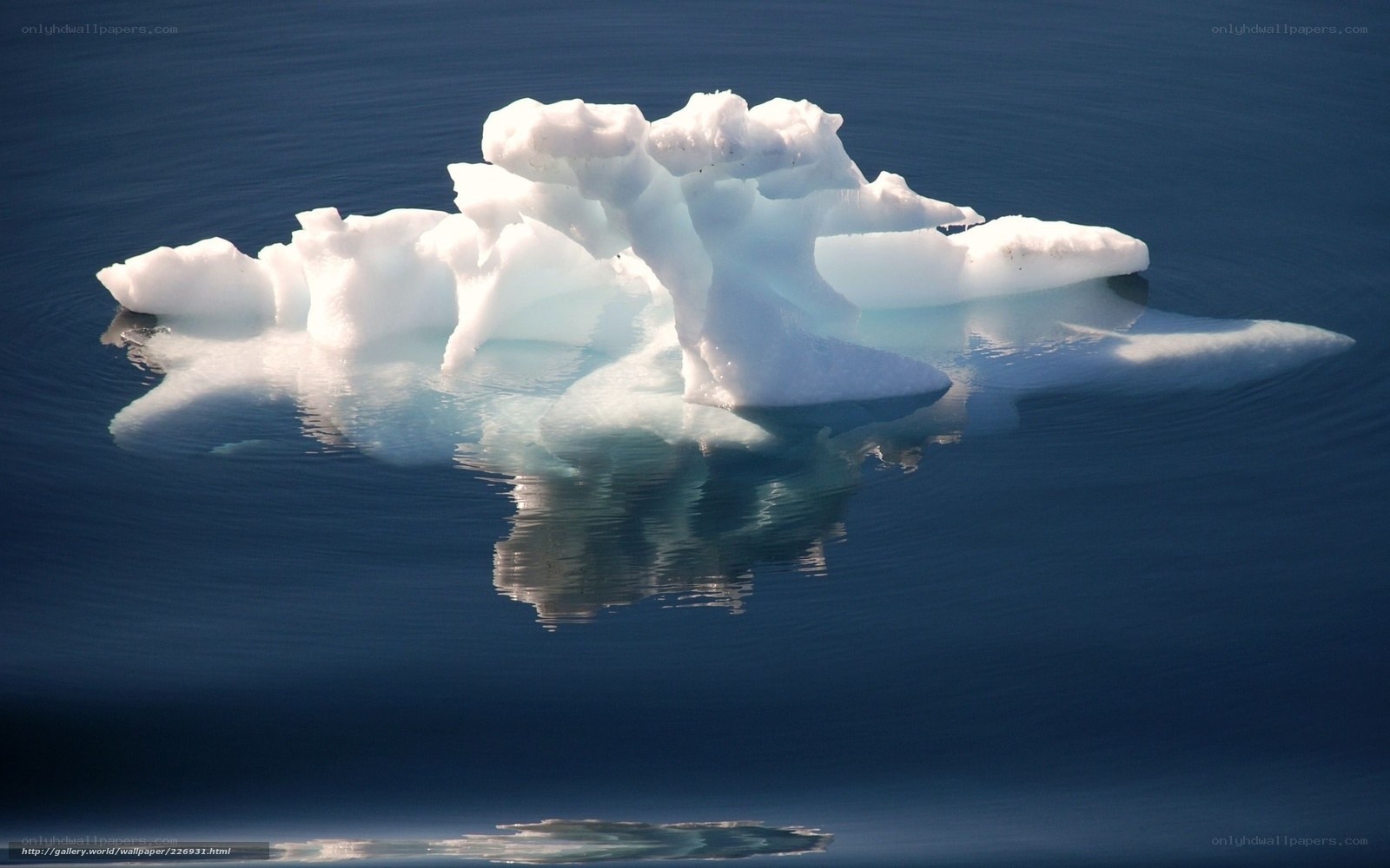 Iceberg floating in calm water