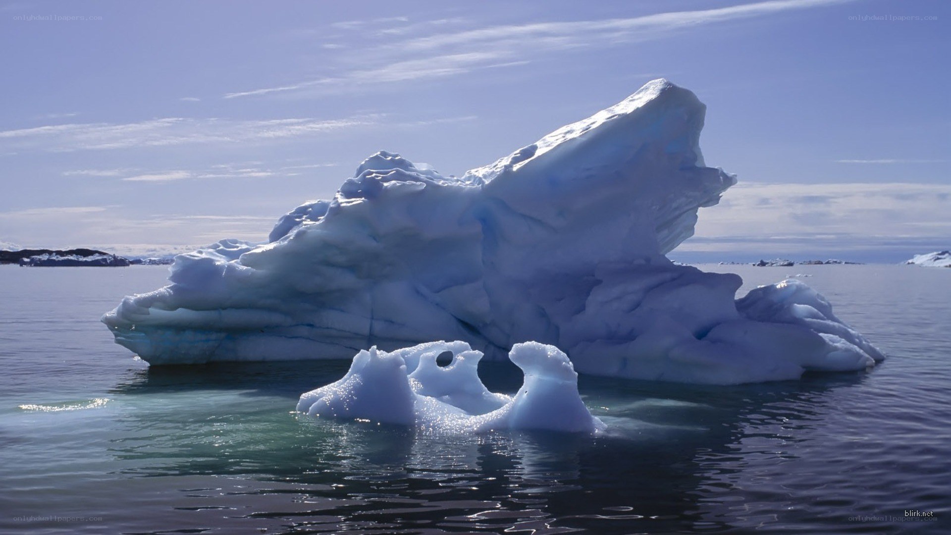 Iceberg floating in calm waters