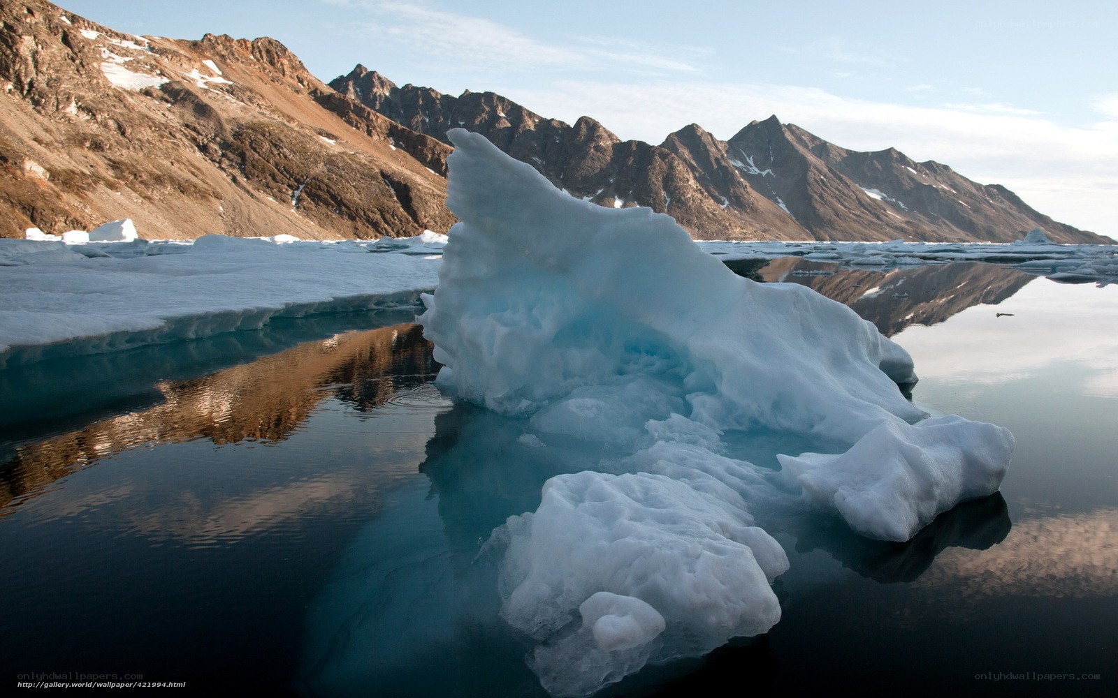 Iceberg in a calm arctic bay