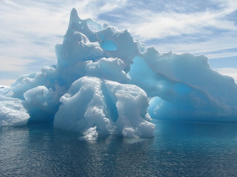 Iceberg in Blue Water — Serene, Afternoon, Photograph, Sky