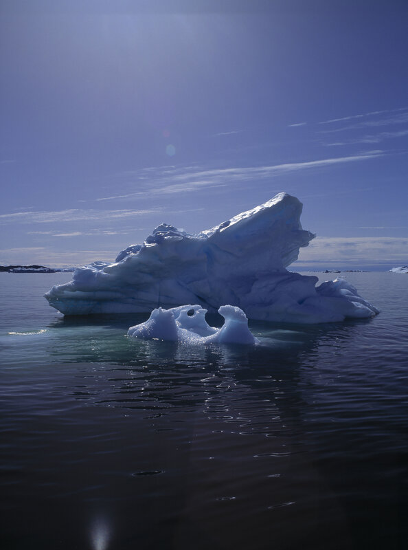 Iceberg in Calm Water — Blue, Serene, Afternoon, Photograph, Calm Water, Sky