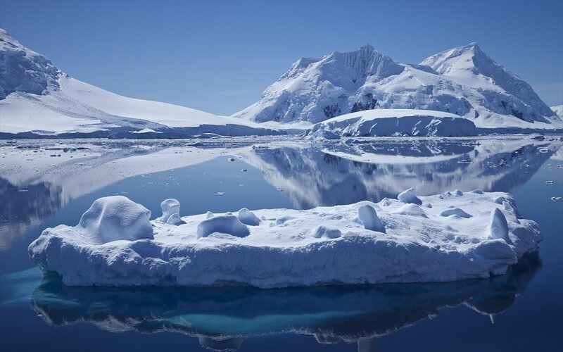 Iceberg in Calm Water — Blue, Serene, Afternoon, Photograph, Mountains
