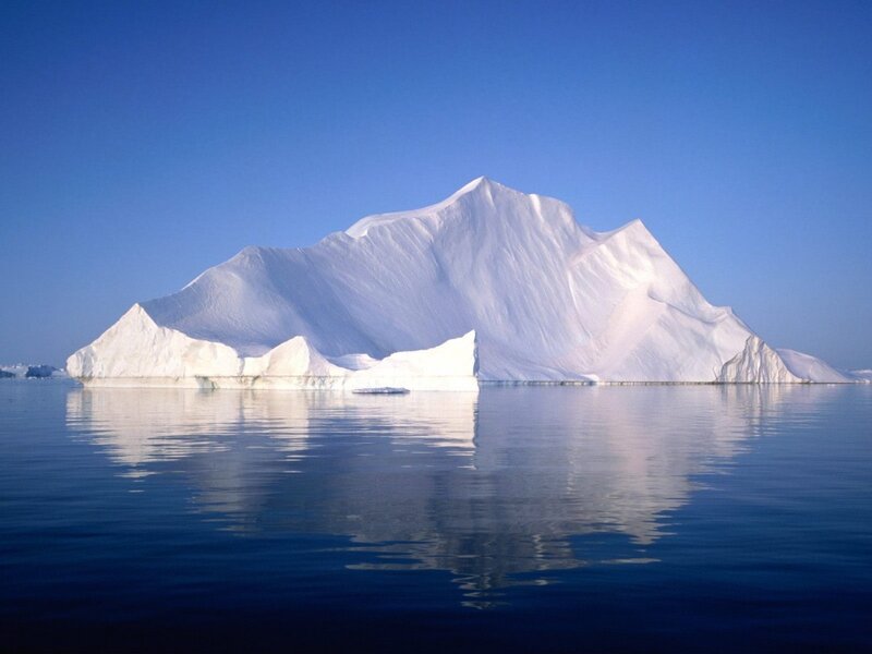 Iceberg in Calm Water — Blue, Serene, Afternoon, Photograph, Sky