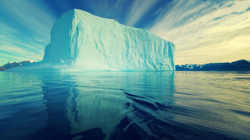 Iceberg in Calm Water — Blue, Serene, Sunset