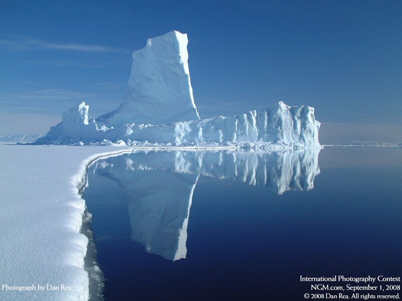 Iceberg in Calm Water — Blue, Serene, Winter, Photograph, Snow