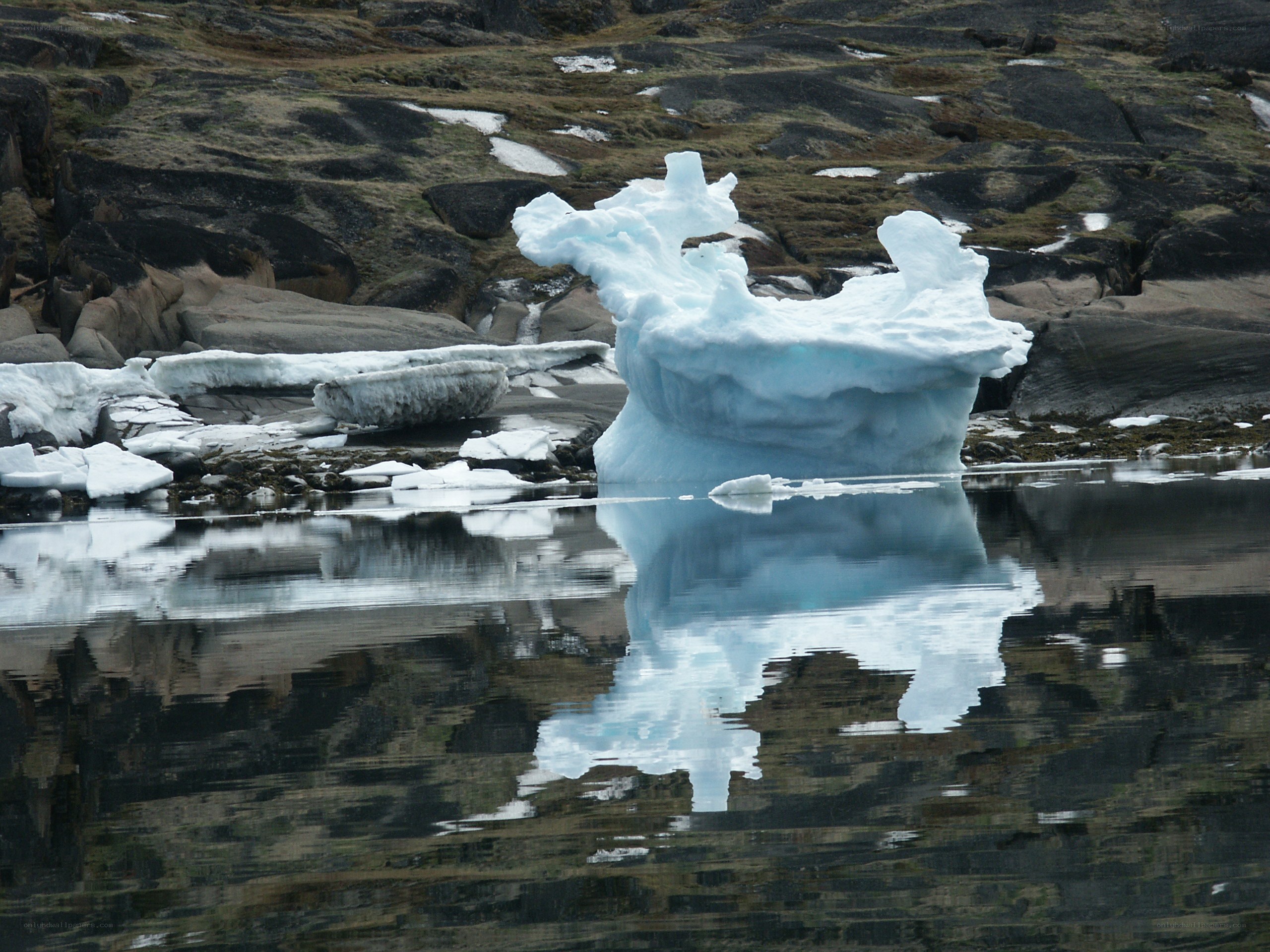 Iceberg in calm water