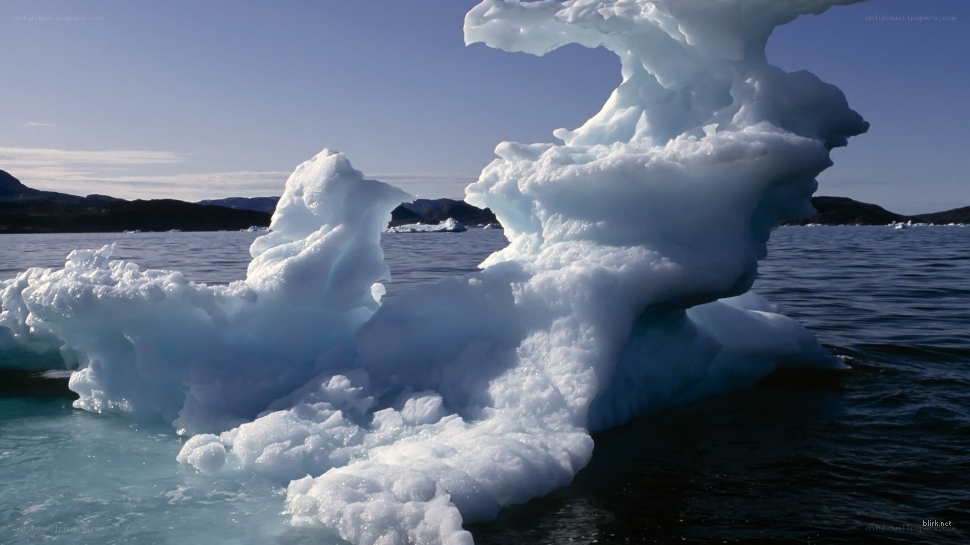 Iceberg in calm waters