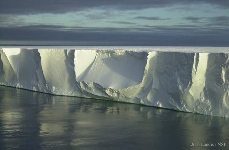 iceberg in calm waters