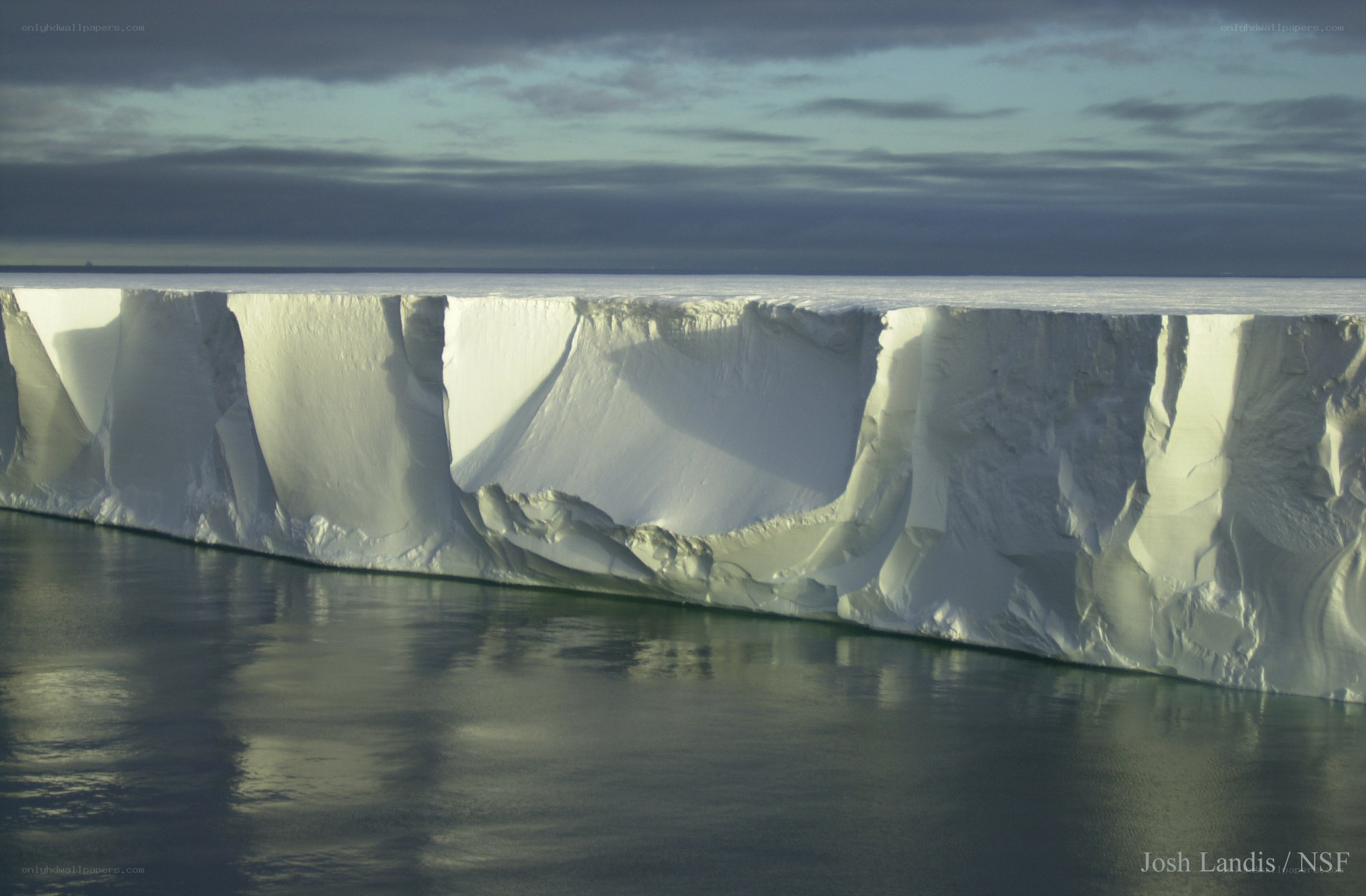 iceberg in calm waters