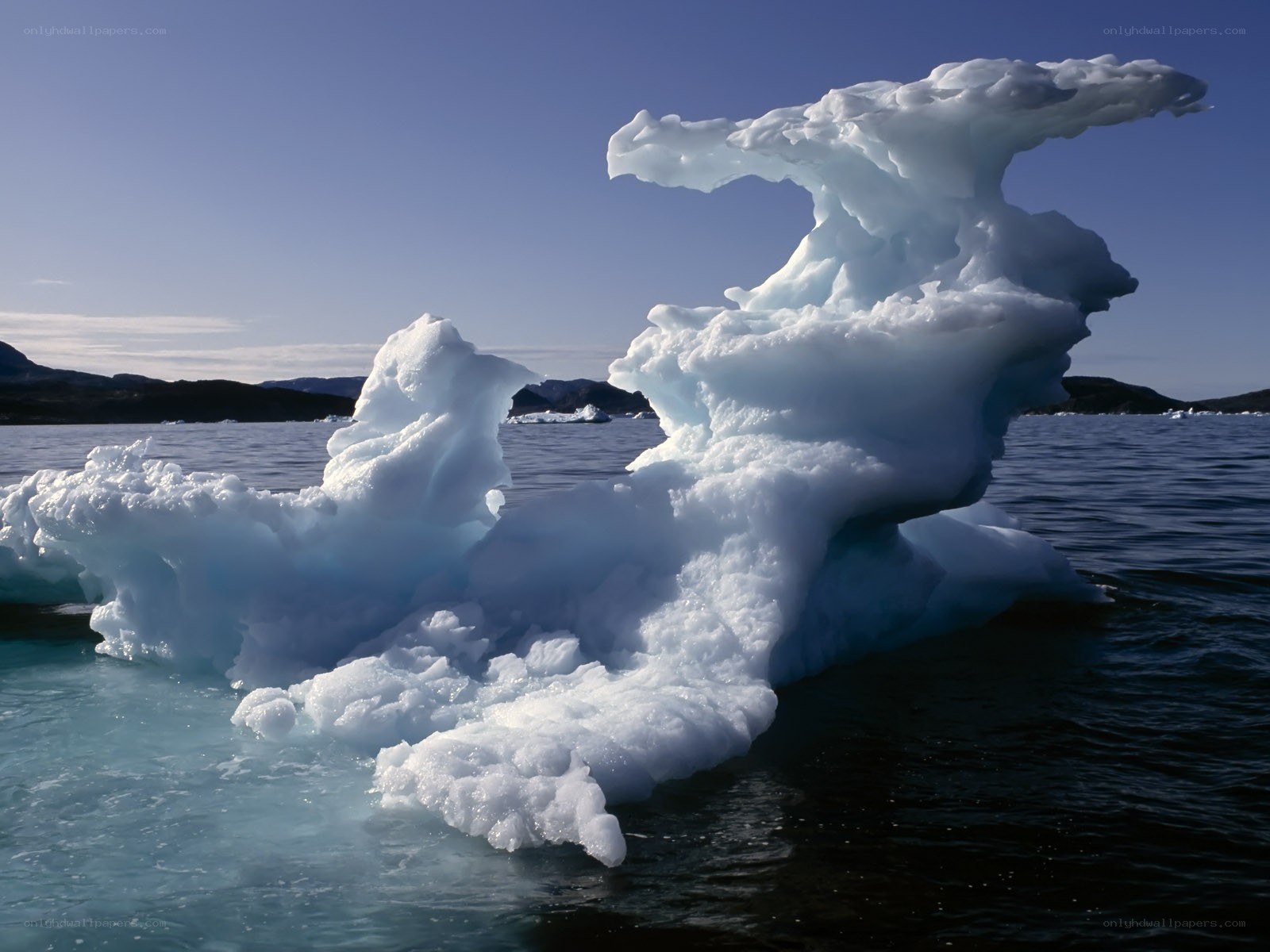 Iceberg in calm waters