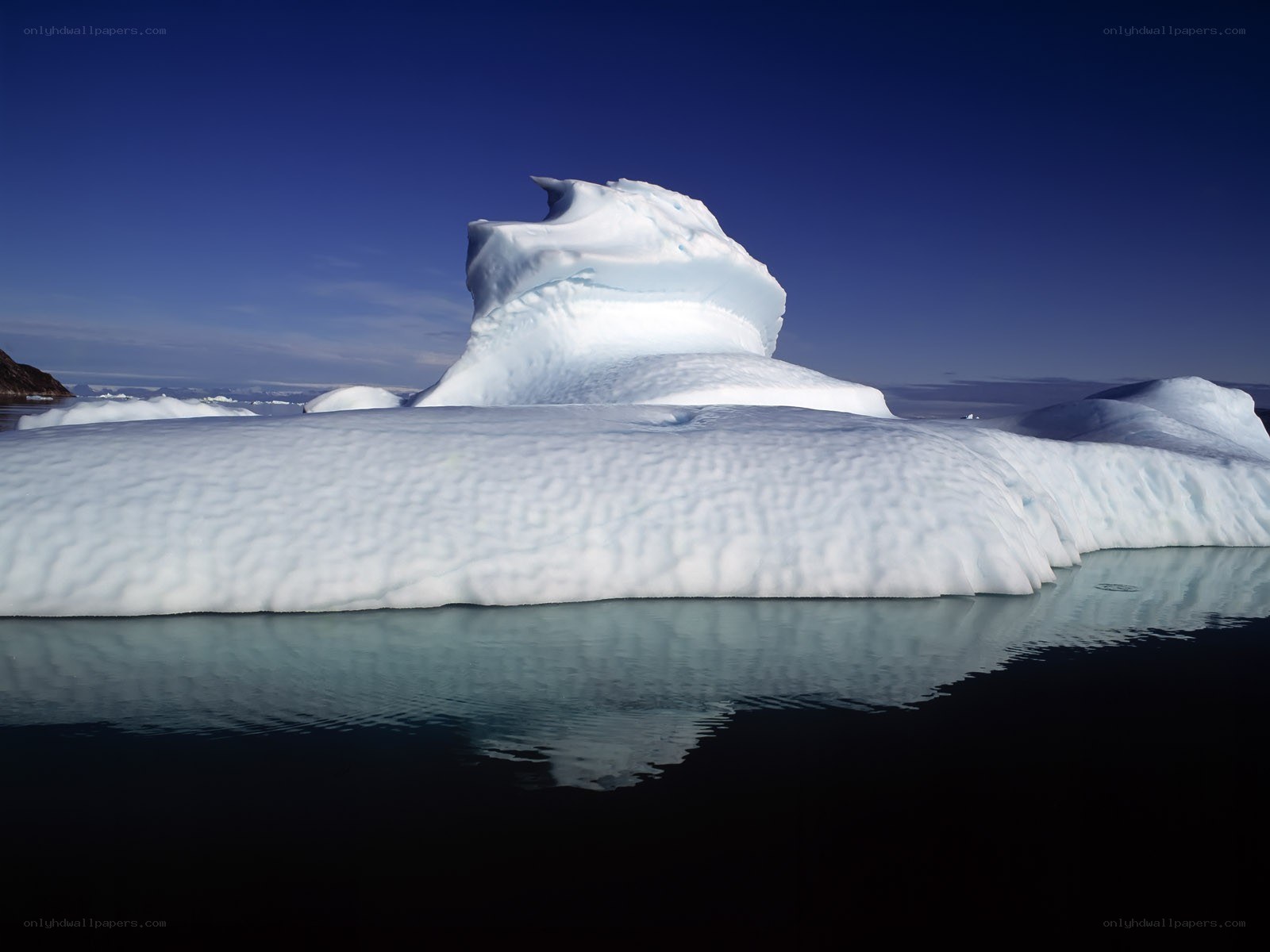 Iceberg in calm waters