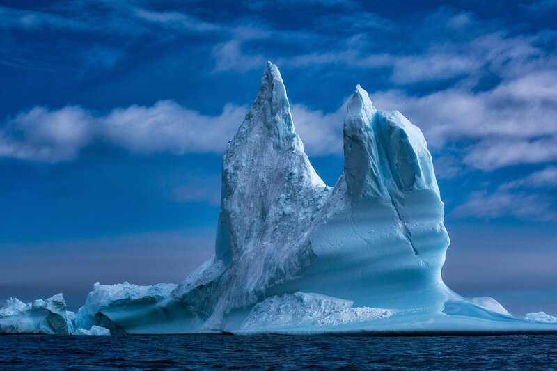 Iceberg in Ocean — Blue, Dramatic, Photograph, Clouds