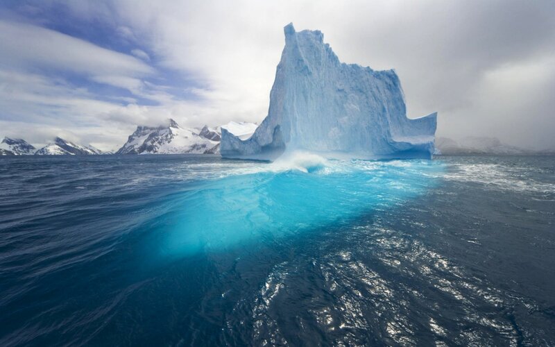 Iceberg in Ocean — Blue, Dramatic, Photograph, Mountains