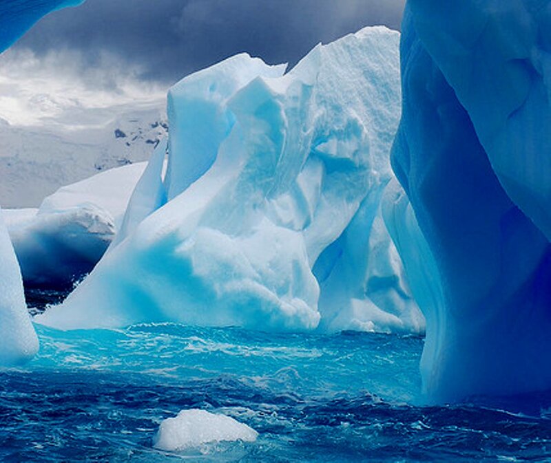 Iceberg in Ocean — Blue, Dramatic, Photograph, Sky