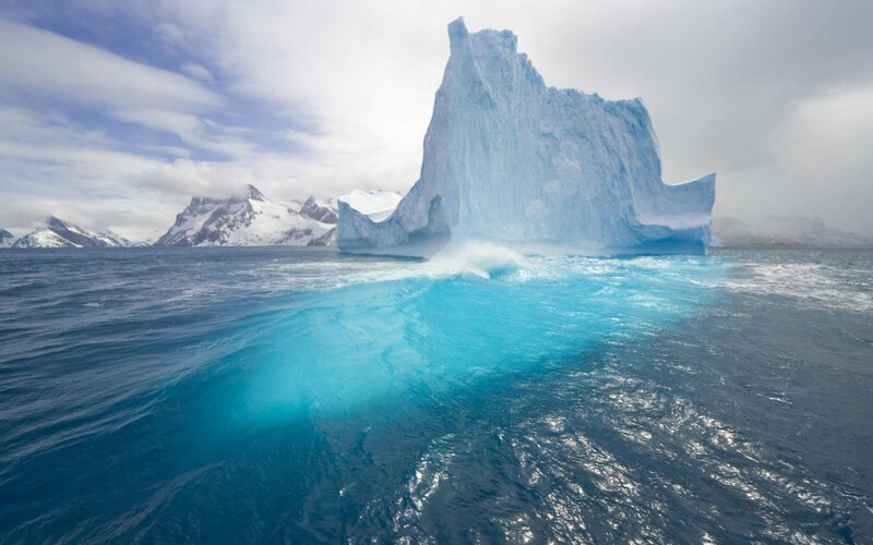 Iceberg in Ocean — Blue, Dramatic, Photograph