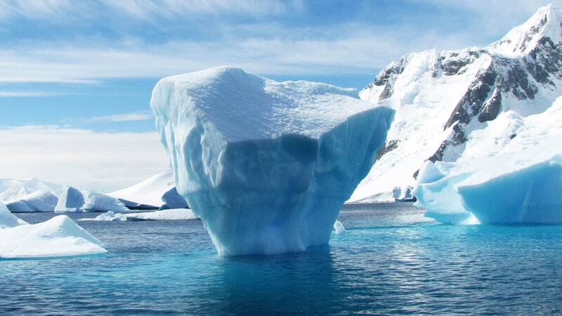 Iceberg in Ocean — Blue, Serene, Afternoon, Photograph, Mountain
