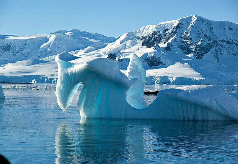 Iceberg in Ocean — Blue, Serene, Afternoon, Photograph, Mountains