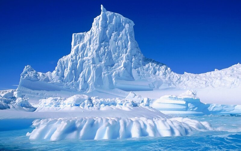 Iceberg in Ocean — Blue, Serene, Afternoon, Photograph, Sky, Snow, White