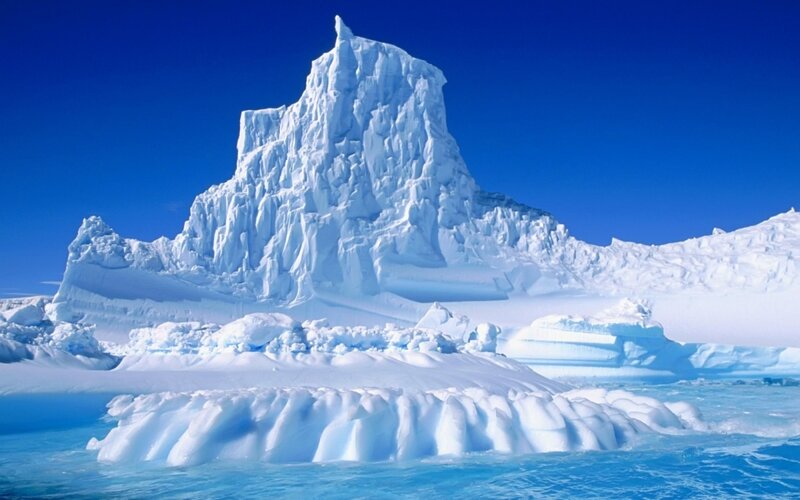 Iceberg in Ocean — Snow