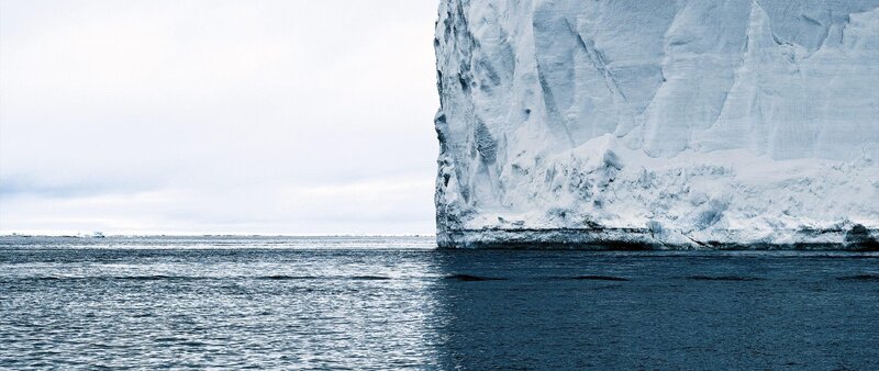 Iceberg in Ocean — White, Cold, Serene