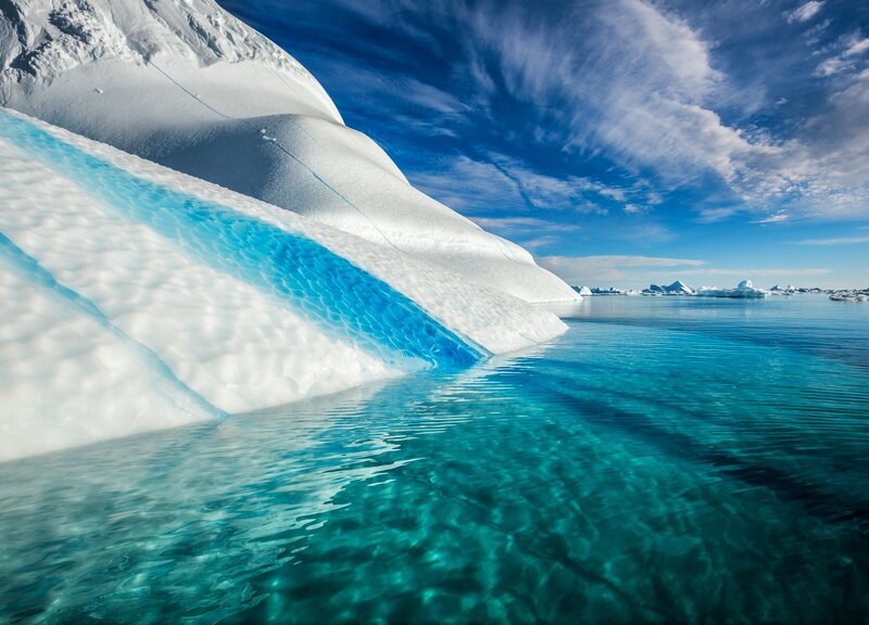 Iceberg in Turquoise Water