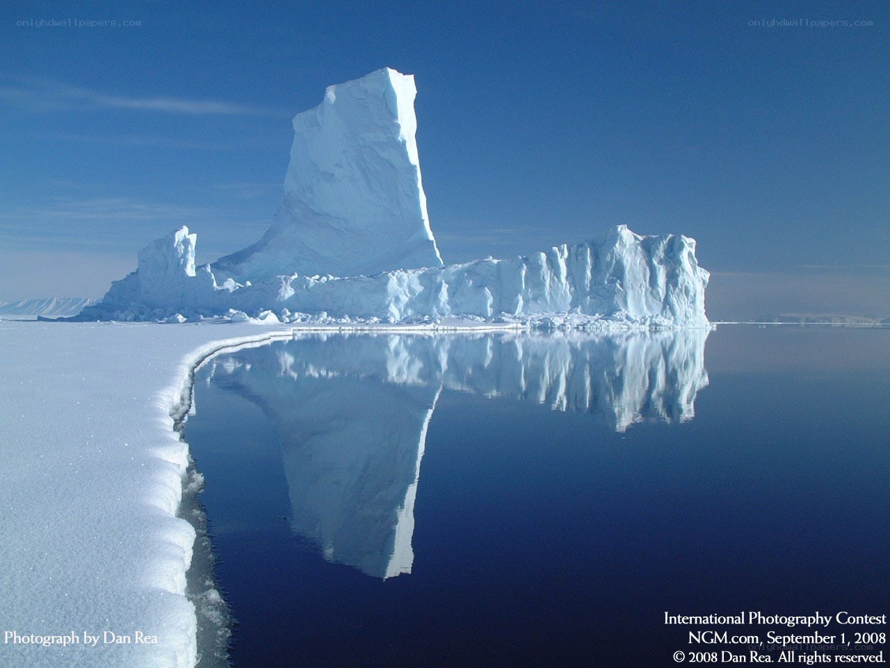 Iceberg reflection in calm water