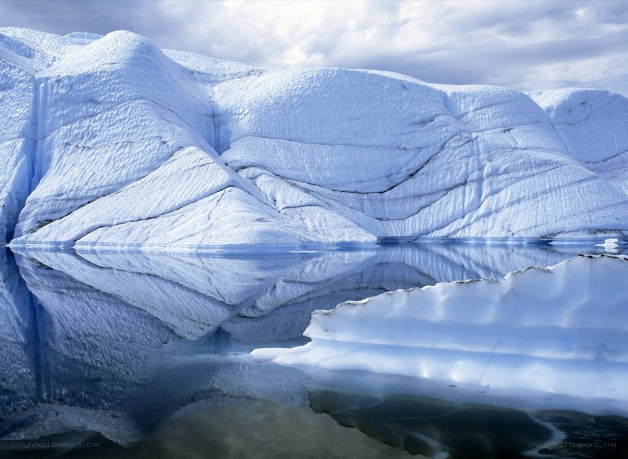 Iceberg reflection in calm water