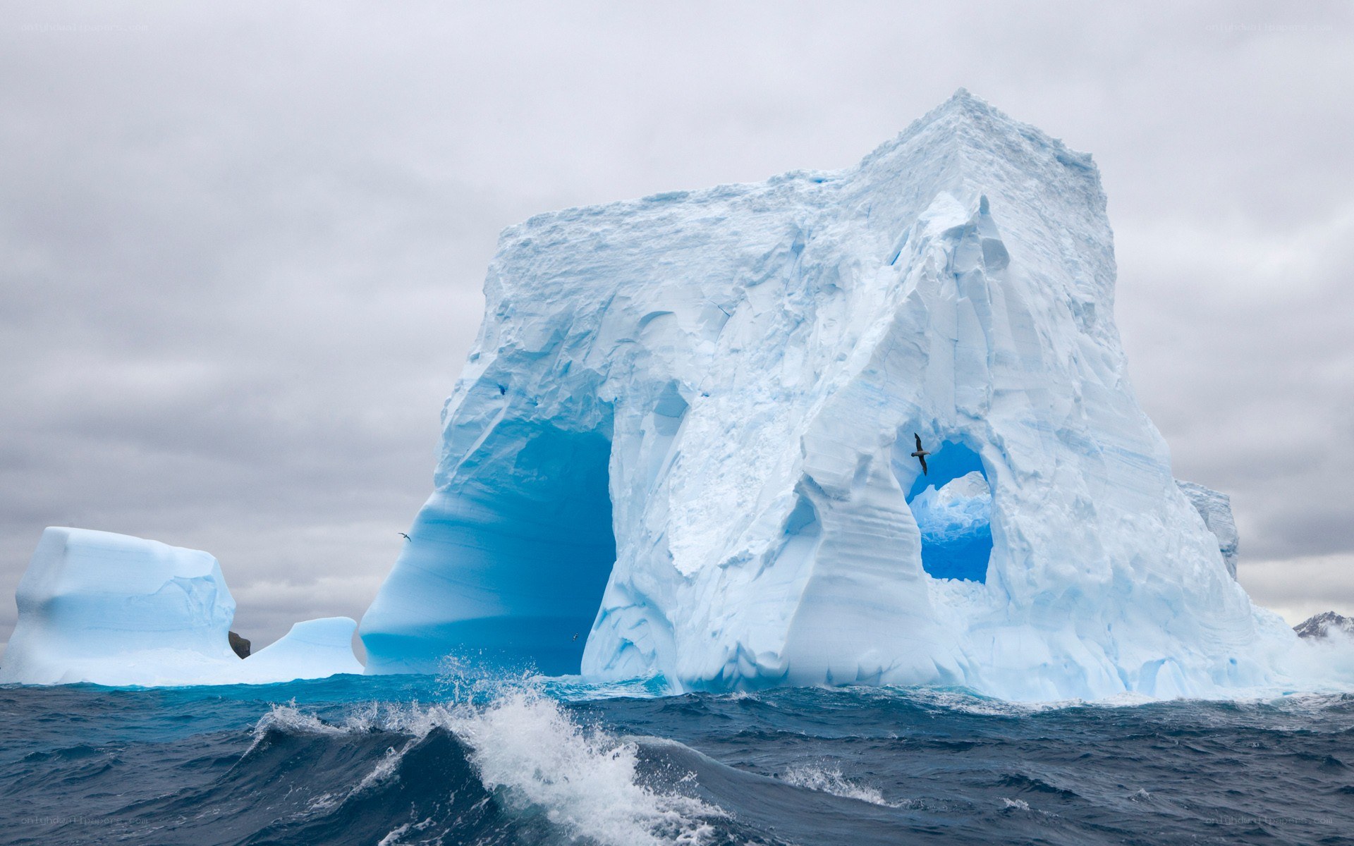 Iceberg with blue arch
