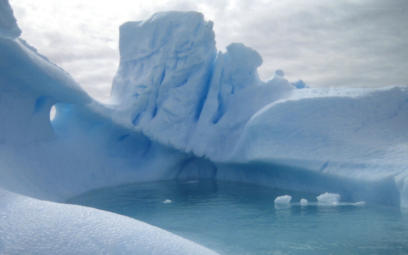 Iceberg with blue water